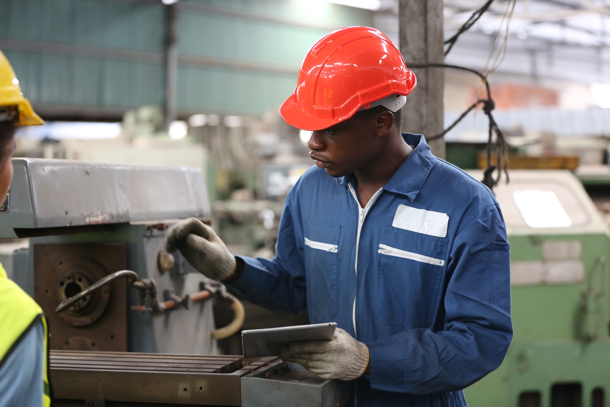 industrial factory employee working in metal manufacturing industry
